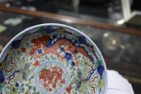 A Chinese wucai dragon and phoenix saucer dish, Kangxi mark, 19th century diameter 13.5cm